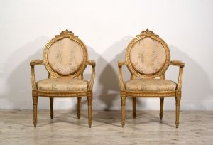 PAIR OF NEOCLASSICAL ARMCHAIRS, in lacquered and gilded carved wood, Turin, late 18th century